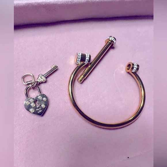 CHANEL heart and lock authentic charm on gold plated bracelet